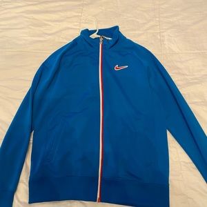 blue and red nike zip up jacket